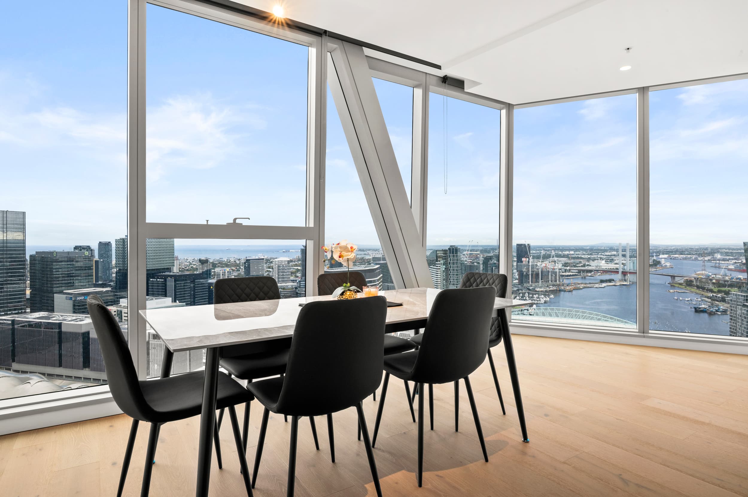 Dining area with city views at Havenly Escape Melbourne CBD