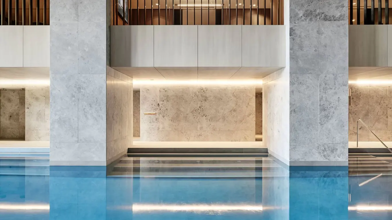 Heated indoor 25m lap pool and wellness facilities at Havenly Escape West Side Place