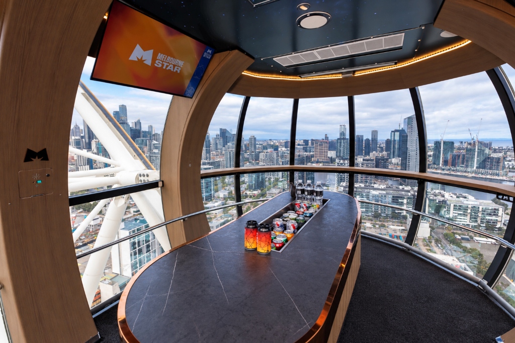 Melbourne Star Star Class VIP Cabin Interior with Marble Drinks Table, Integrated Media Screen and 360 Panoramic CBD Skyline Views